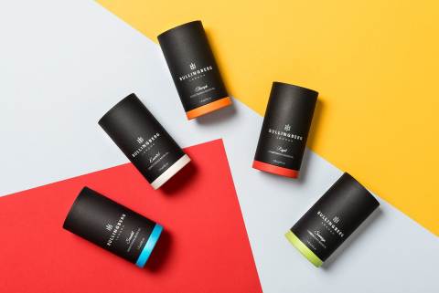 Five retail packs of Bullingberg Beard oils laying down showcase Landed design agency services.