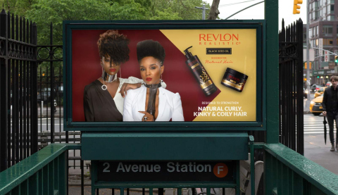 Marketing billboard showcasing new Brand Design for Revlon Ethnic Haircare. Landed Creative, Brighton, UK