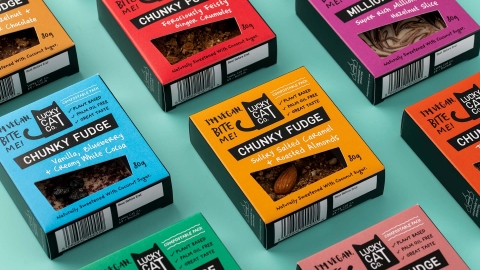 Food packaging cartons displayed to showcase new Packaging design and identity design for Lucky Cat Co.